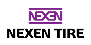 A purple nexen tire logo on top of a white background.